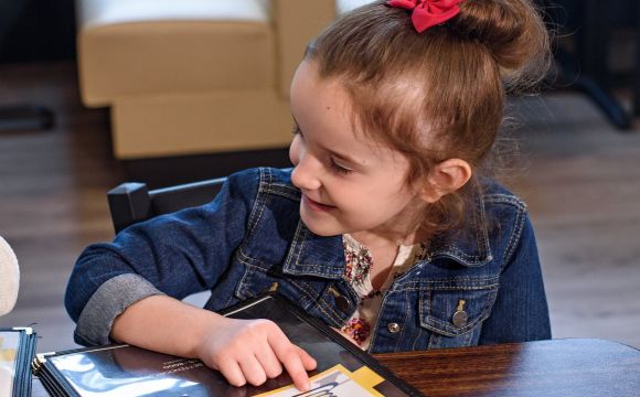 Cute granddaughter at Stack's Pancake house in Bettendorf, IA