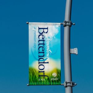Flag that says Downtown Bettendorf hanging on a light pole