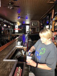 Harley Corin's bartender prepares drinks